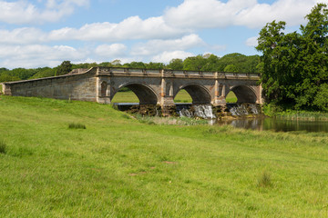 Fototapeta na wymiar Attractive stone bridge in Derbyshire,UK