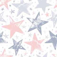 Obraz premium Seamless pattern with pink, gray and blue hand drawn vector stars in doodle style isolated on white background. 