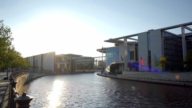 Berlin / Germany: July 2019 - Footage of Paul Lobe House in Berlin. Boats, spree river, people, clouds, summer / 4K Video Footage