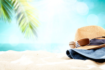 Obraz na płótnie Canvas Summer background of sand with sea and coconut palm 