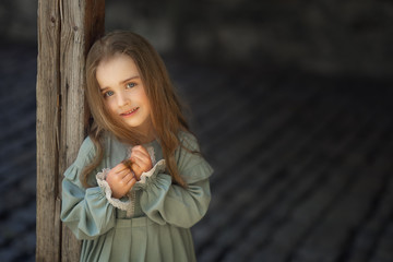 smling adorable girl looking at the camera