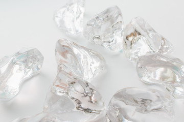 Scattered crystals on white background, beautiful gems