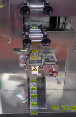 Sauce sachet automatic vertical filling and sealing machine. Food industry