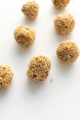 Healthy homemade cookies with nuts and sesame on white background