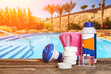 Equipment with chemical cleaning products and tools for the maintenance of the swimming pool.