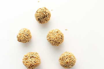 Healthy homemade cookies with nuts and sesame on white background