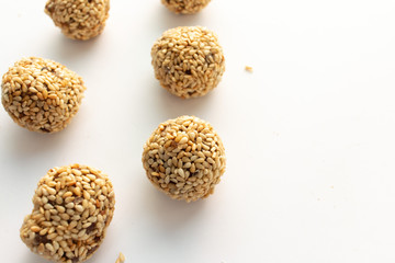 Healthy homemade cookies with nuts and sesame on white background