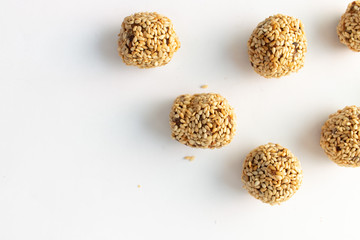Healthy homemade cookies with nuts and sesame on white background