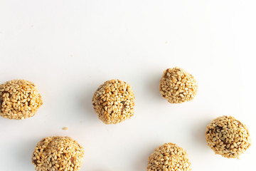 Healthy homemade cookies with nuts and sesame on white background