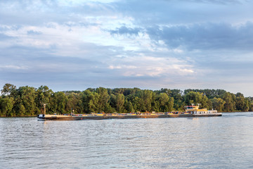 cargo ship crusing down the river Rhine