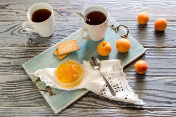 Morning tea with apricot jam close-up