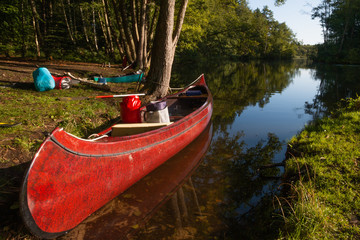 canoe on the riverbank