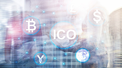 ICO - Initial coin offering, Blockchain and cryptocurrency concept on blurred business building background.