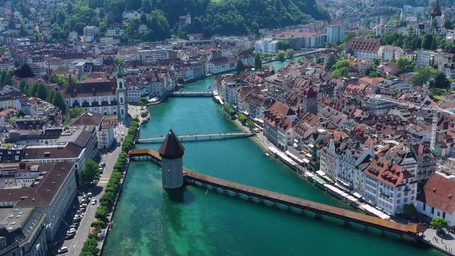 Aerial view of cityscape of Lucerne, historic centre of city, famous landmark Chapel Bridge (Kapellbr&uuml;cke) across river Reuss - landscape panorama of Switzerland from above, Europe