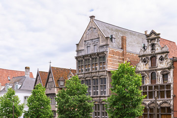 Fototapeta premium historical gable houses in street called Vleeshouwersstraat. Mechelen, Belgium 