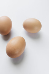 Chicken eggs on white background