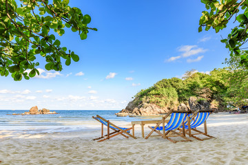 Clear turquoise blue sea and beach beds at Bo Thong Lang Bay, Bang Saphan district, Prachuap Khiri Khan, Thailand