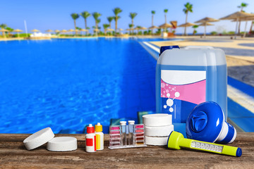 Equipment with chemical cleaning products and tools for the maintenance of the swimming pool.