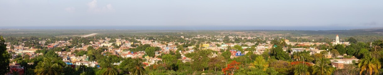 Aerial panoramic view of a small touristic Cuban Town during a sunny and cloudy summer day. Taken in Trinidad, Cuba.