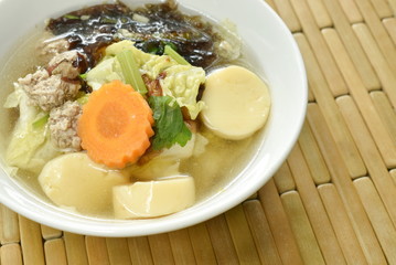 boiled egg tofu with minced pork and cabbage topping seaweed soup on bowl