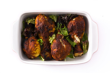 Roasted tandoori chicken isolated on white background. Top view