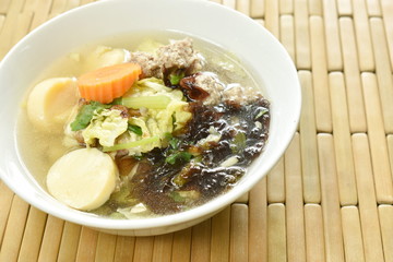 boiled egg tofu with minced pork and cabbage topping seaweed soup on bowl