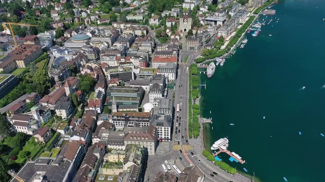 Aerial view of cityscape of Lucerne, beautiful Swiss historic city, lakeside part of city, crystal clear waters of lake Lucerne - landscape panorama of Switzerland from above, Europe