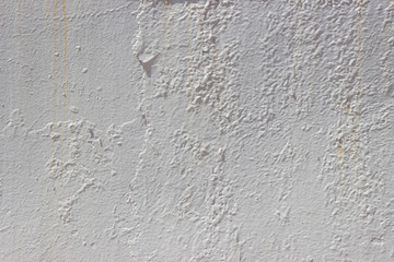 Old Dirty Plaster Wall, With Flakes Of Paint. Rough Surface. Old Weathered Painted Background Texture. Vintage Scratch Grunge Urban Background. Distress texture for your design.