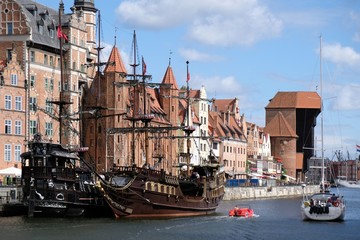 Poland, Gdansk - galleon ships and other boats by the bank of Motlava canal in Old City