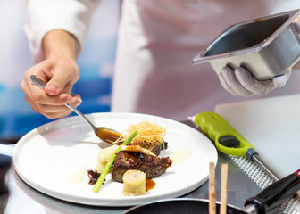 Chef cooking food in the kitchen, Chef preparing food