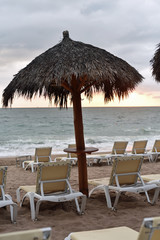 Beach Chairs, Palapas, and Sunset