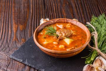 Chanahi a traditional Georgian meat stew in a bowl on stoyn board