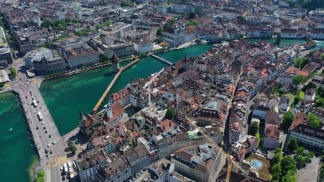 Aerial view of cityscape of Lucerne, historic centre of city, famous landmark Chapel Bridge (Kapellbr&uuml;cke) across river Reuss - landscape panorama of Switzerland from above, Europe