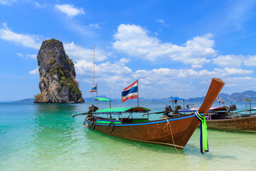 Fototapeta na wymiar Beautiful crystal clear turquoise blue sea and boats at Ko Poda Island, Ao Phra Nang bay, Krabi, Thailand