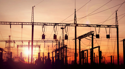 silhouette of electric power substation at sunset - 277391013
