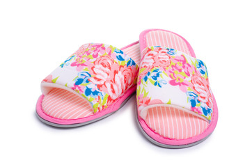 Female pink slippers on white background isolation