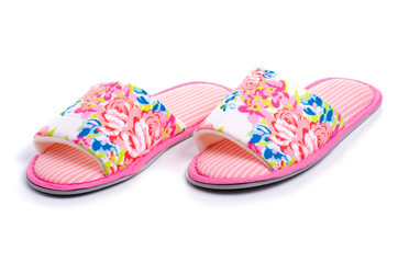 Female pink slippers on white background isolation