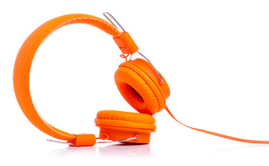 Orange headphones sound on white background isolation