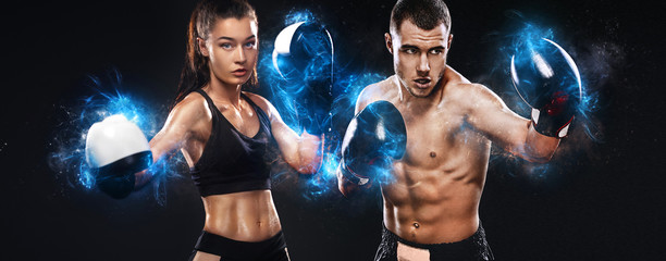 Two sportsmans, woman and man boxers fighting in gloves on black background. Boxing and fitness...