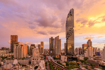 Bangkok business district cityscape with skyscraper at twilight, Thailand