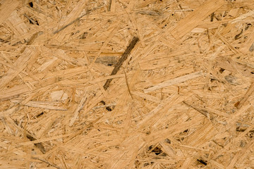 photo of the brownd chipboard texture in close view