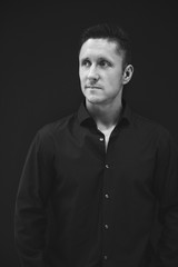 Business man in black shirt portrait