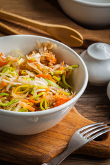 Salad with leek, carrots and apples.