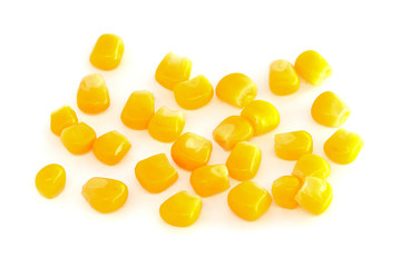 Yellow corn seeds isolated on white background close up. macro