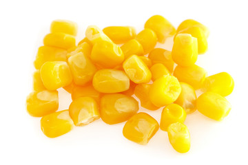 Yellow corn seeds isolated on white background close up. macro