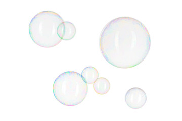 Realistic bright soap bubbles isolated on white background