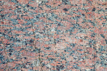 Surface of a granite stone, texture background