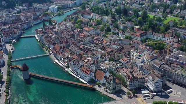 Aerial view of cityscape of Lucerne, historic centre of city, famous landmark Chapel Bridge (Kapellbr&uuml;cke) across river Reuss - landscape panorama of Switzerland from above, Europe