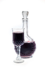 Carafe and glass with red wine
