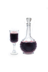 Carafe and glass with red wine